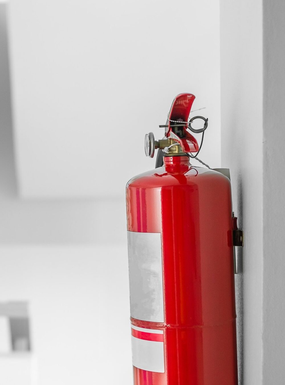 Fire extinguisher system on the wall background,
